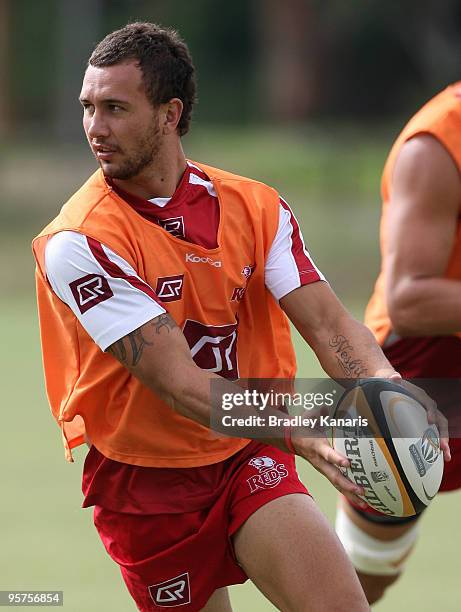 Quade Cooper of the Reds prepares to pass during a Reds Super 14 training session at Ballymore Stadium on January 14, 2010 in Brisbane, Australia.