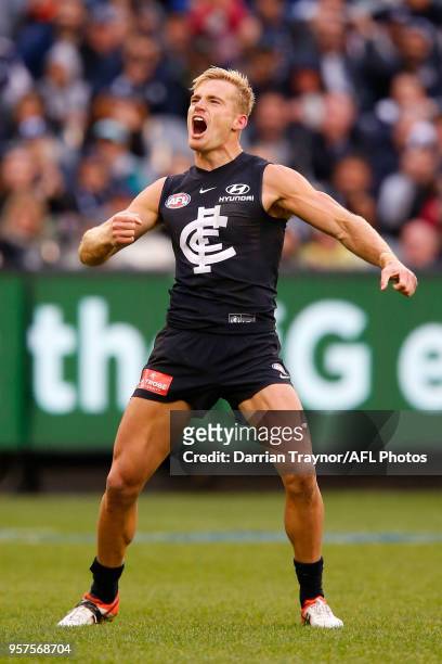 Sam Kerridge of the Blues celebrates a goal during the round eight AFL match between the Carlton Blues and the Essendon Bombers at Melbourne Cricket...