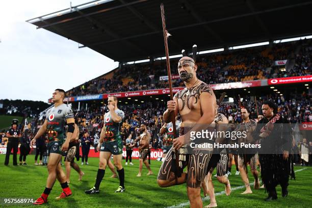 The Warriors are lead out by Maori Warriors ahead of the round 10 NRL match between the New Zealand Warriors and the Sydney Roosters at Mt Smart...