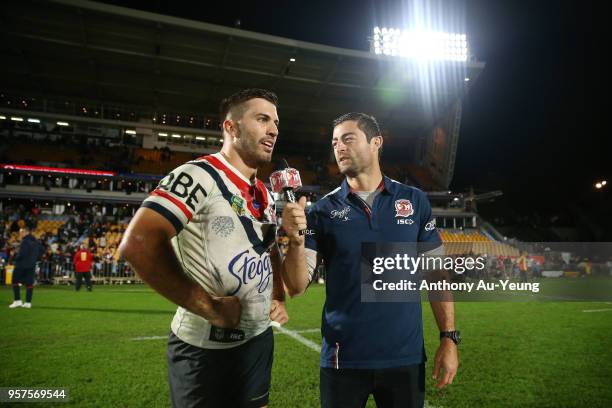 James Tedesco of the Roosters is interveiwed by former Rooster Anthony Minichiello after winning the round 10 NRL match between the New Zealand...