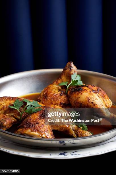 Herb Roasted Chicken with natural jus at Opaline in the Sofitel Hotel photographed in Washington, DC. .