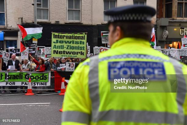 Pro-Palestine demonstrators gather outside the Embassy of Israel in Kensington, to commemorate the 70th anniversary of the Palestinian Exodus, known...