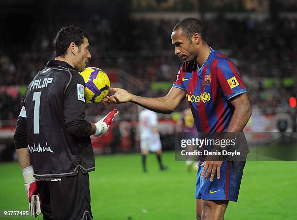 Thierry Henry of Barcelona hands the ball to Andres Palop of Sevilla during the last 16, second leg Copa del Rey match between Barcelona and Sevilla...