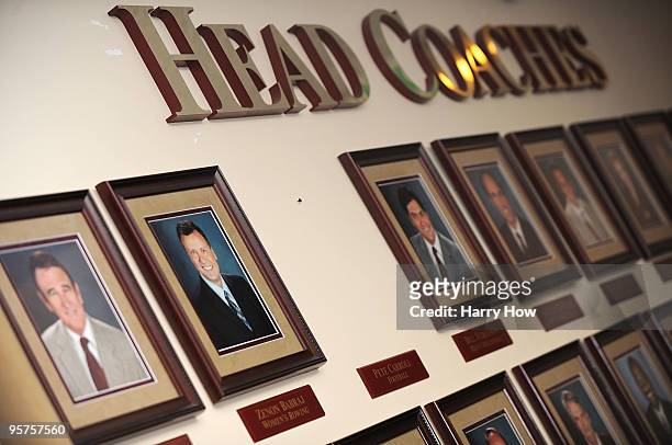 Wall with pictures of USC head coaches is displayed without Pete Carroll as new head coach of the USC Trojans Lane Keffin is introduced during a...