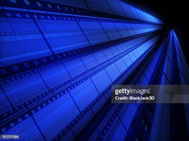 a blue tinted image of cinefilm as a background - movie background stock pictures, royalty-free photos & images