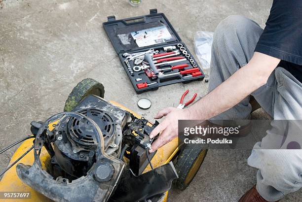 lawnmower repair - lawnmower stock pictures, royalty-free photos & images