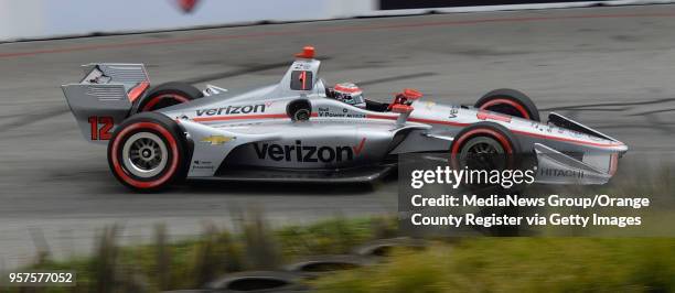 IndyCar second place winner Will Power passes the Aquarium of the Pacific during the IndyCar Race at the Toyota Grand Prix of Long Beach in Long...