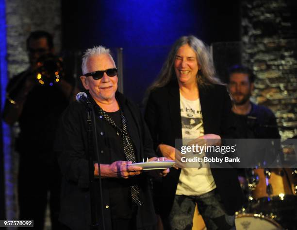 Singer Patti Smith surprises Eric Burdon for his 77th birthday with a birthday cake at the Eric Burdon & The Animals Birthday Bash at City Winery on...