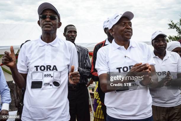 Burundi's former first vice-president Yves Sahinguvu and first vice-president of the National Assembly Agathon Rwasa react during the opposition's...