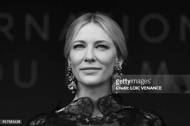 Australian actress and President of the Jury Cate Blanchett poses as she arrives on May 8, 2018 for the screening of their film "Todos Lo Saben " and...