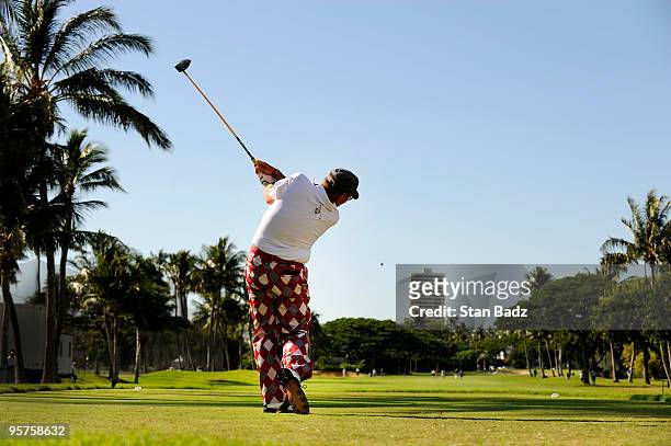 John Daly hits from the first tee box during the Pro-Am round for the Sony Open in Hawaii held at Waialae Country Club on January 13, 2010 in...