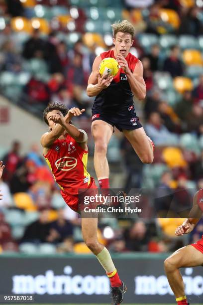 Mitch Hannan of the Demons takes a mark during the round eight AFL match between the Gold Coast Suns and the Melbourne Demons at The Gabba on May 12,...