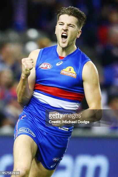 Marcus Bontempelli of the Bulldogs celebrates a goal during the round eight AFL match between the Western Bulldogs and the Brisbane Lions at Etihad...