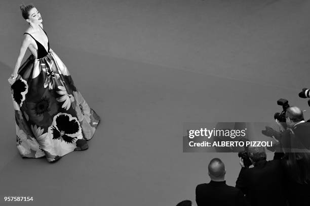 Actress Amber Heard poses as she arrives on May 10, 2018 for the screening of the film "Sorry Angel " at the 71st edition of the Cannes Film Festival...