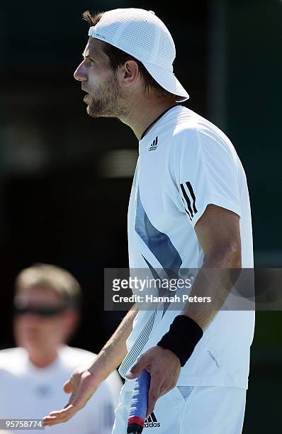Jurgen Melzer of Austria complains to the umpire during his quarter final match against Arnaud Clement of France at ASB Tennis Centre on January 14,...