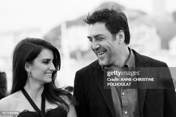 Spanish actress Penelope Cruz and her husband Spanish actor Javier Bardem pose on May 9, 2018 during a photocall for the film "Todos Lo Saben " at...