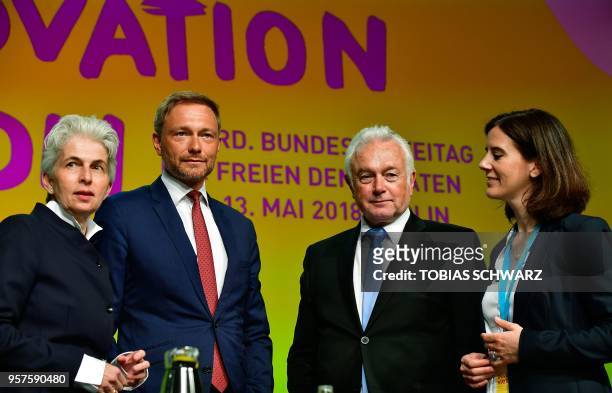 Christian Lindner , chairman of Germany's liberal Free Democratic Party , and FDP vice-chairmen Wolfgang Kubicki , Katja Suding and Marie-Agnes...
