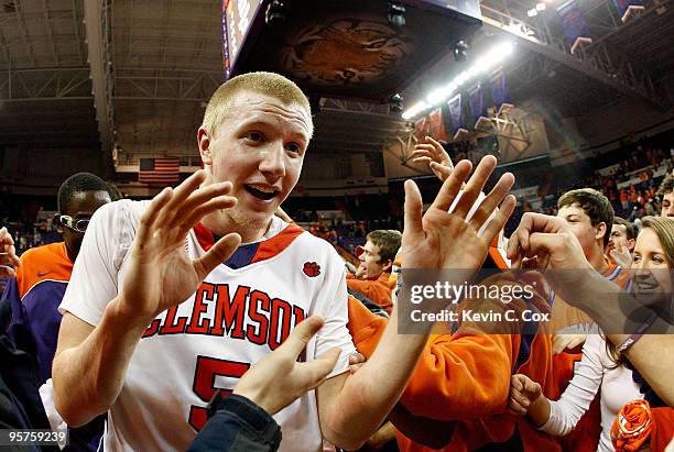 Tanner Smith of the Clemson Tigers celebrates after their 83-64 win over the North Carolina Tar Heels at Littlejohn Coliseum on January 13, 2010 in...