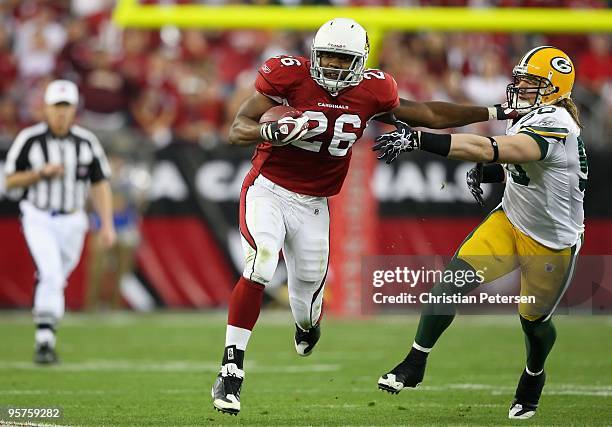 Runningback Beanie Wells of the Arizona Cardinals rushes the football during the 2010 NFC wild-card playoff game against the Green Bay Packers at the...