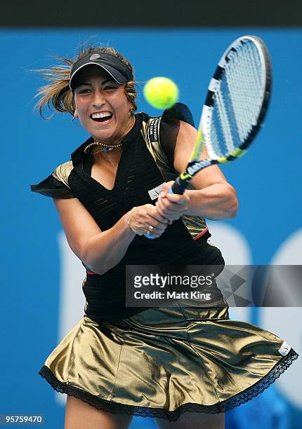 Aravane Rezai of France plays a backhand in her semi final match against Serena Williams of the USA at Sydney Olympic Park Sports Centre on January...