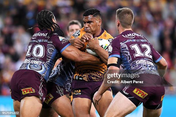 Tevita Pangai of the Broncos is tackled during the round ten NRL match between the Manly Sea Eagles and the Brisbane Broncos at Suncorp Stadium on...