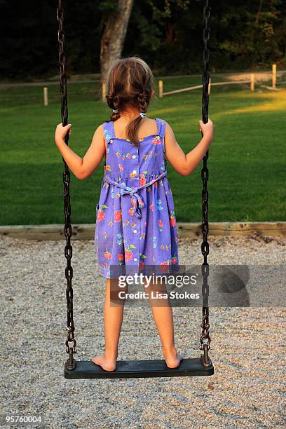 swinging  - lisa stokes stock pictures, royalty-free photos & images