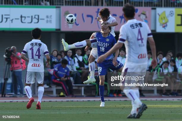 Yuto Iwasaki of Kyoto Sanga and Akihiro Sato of Tokushima Vortis during the J.League J2 match between Tokushima Vortis and Kyoto Sanga at Naruto...