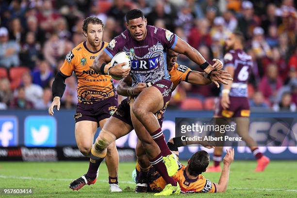 Taniela Paseka of the Sea Eagles takes on the defence during the round ten NRL match between the Manly Sea Eagles and the Brisbane Broncos at Suncorp...