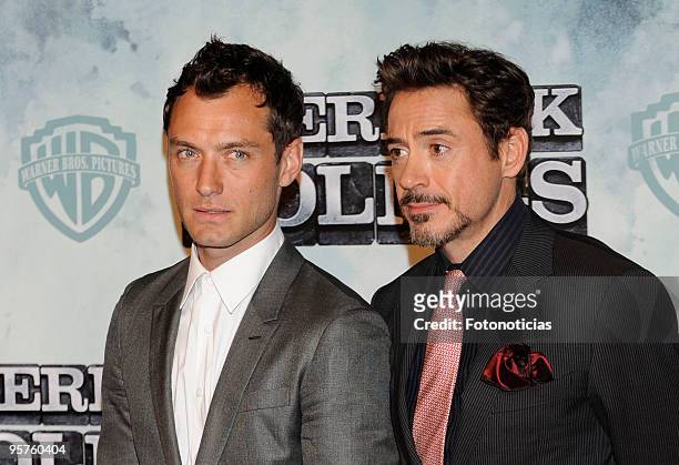 Actors Jude Law and Robert Downey Jr. Arrive at the premiere of ''Sherlock Holmes'' at Kinepolis Cinema on January 13, 2010 in Madrid, Spain.