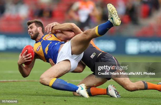 Fraser McInnes of the Eagles is tackled during the round eight AFL match between the Greater Western Giants and the West Coast Eagles at Spotless...