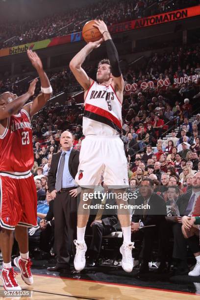 Rudy Fernandez of the Portland Trail Blazers goes up for a shot over Jodie Meeks of the Milwaukee Bucks during a game on January 13, 2010 at the Rose...