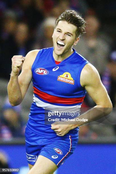 Marcus Bontempelli of the Bulldogs celebrates a goal during the round eight AFL match between the Western Bulldogs and the Brisbane Lions at Etihad...