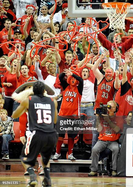 Rebel fans try to distract Kawhi Leonard of the San Diego State Aztecs as he shoots a free throw during a game at the Thomas & Mack Center January...