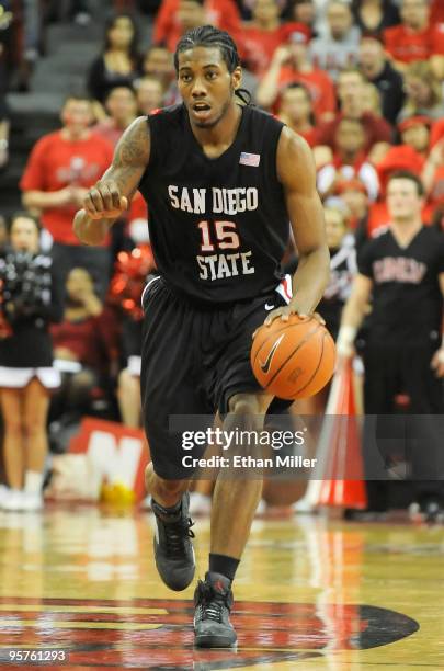 Kawhi Leonard of the San Diego State Aztecs brings the ball up the court during a game against the UNLV Rebels at the Thomas & Mack Center January...