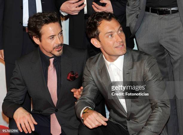 Actors Robert Downey Jr. And Jude Law arrive at the premiere of ''Sherlock Holmes'' at Kinepolis Cinema on January 13, 2010 in Madrid, Spain.