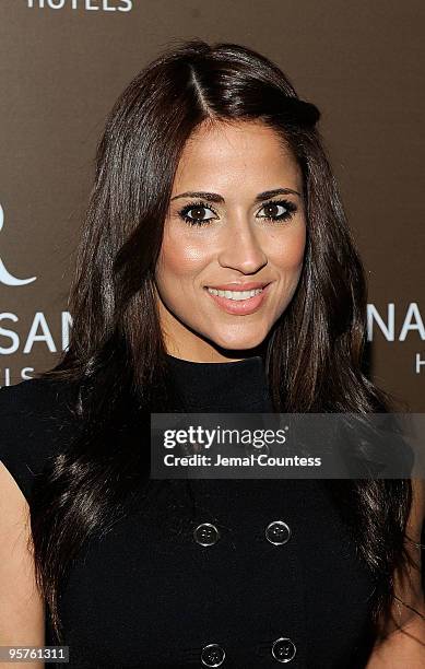 Media personality Jackie Guerrdio poses for photos during the launch party for Emilio Estefan's book, "The Rhythm of Success: How an Immigrant...