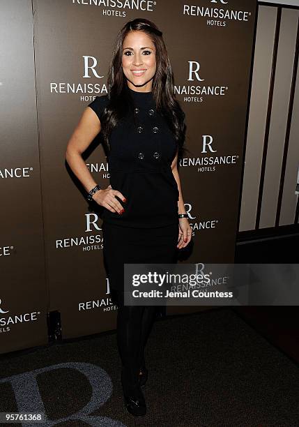 Media personality Jackie Guerrdio poses for photos during the launch party for Emilio Estefan's book, "The Rhythm of Success: How an Immigrant...