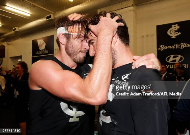 Dale Thomas and Kade Simpson of the Blues celebrate during the 2018 AFL round eight match between the Carlton Blues and the Essendon Bombers at the...