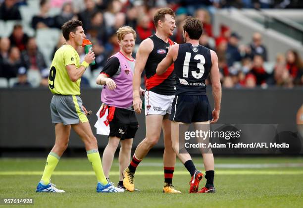 Jed Lamb of the Blues remonstrates with Brendon Goddard of the Bombers during the 2018 AFL round eight match between the Carlton Blues and the...