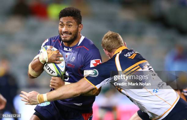 Amanaki Mafi of the Rebels runs the ball during the round 12 Super Rugby match between the Brumbies and the Rebels at GIO Stadium on May 12, 2018 in...