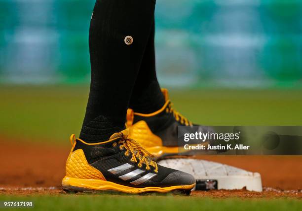 Francisco Cervelli of the Pittsburgh Pirates is seen wearing Adidas baseball cleats and Stance baseball socks against the St. Louis Cardinals at PNC...