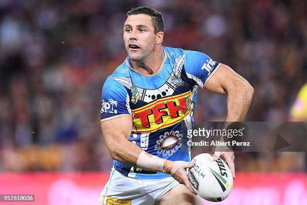 Michael Gordon of the Titans looks to pass the ball during the round ten NRL match between the Melbourne Storm and the Gold Coast Titans at Suncorp...