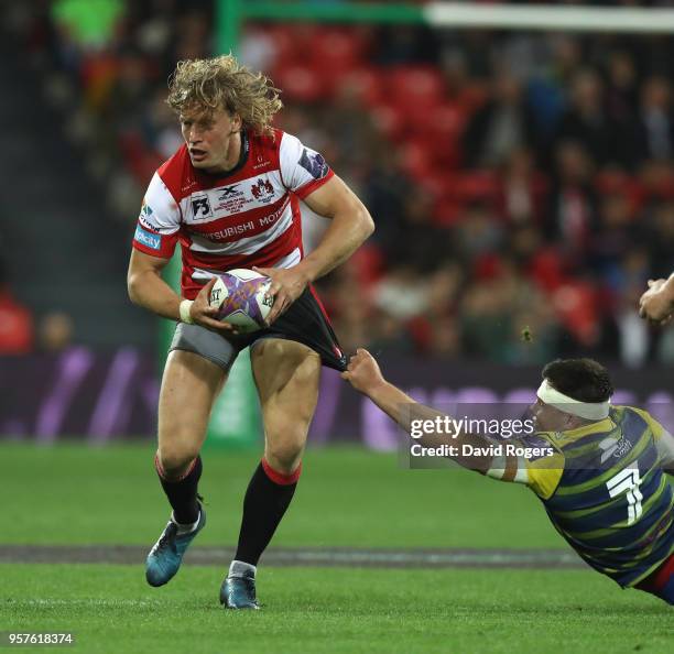 Billy Twelvetrees of Gloucester runs with the ball during the European Rugby Challenge Cup Final match between Cardiff Blues v Gloucester Rugby at...