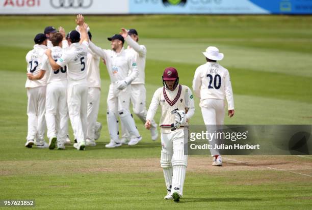 Hampshire players celebrate the wicket of Matt Renshaw of Somerset during Day Two of the Specsavers County Championship Division One match between...