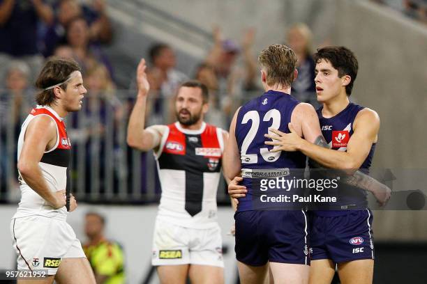 Adam Cerra of the Dockers celebrates a goal with Cam McCarthy of the Dockers during the round eight AFL match between the Fremantle Dockers and the...