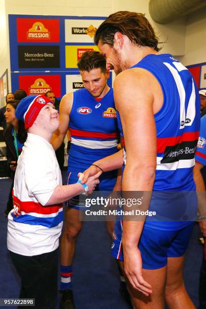 Bulldogs fan celebrates the win Marcus Bontempelli and Tom Boyd during the round eight AFL match between the Western Bulldogs and the Brisbane Lions...