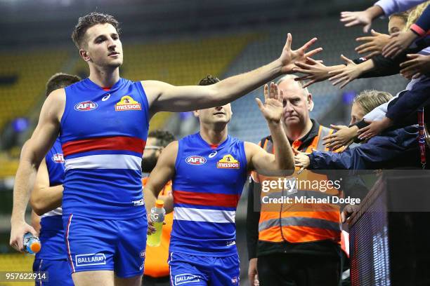 Marcus Bontempelli of the Bulldogs celebrates the win with fans during the round eight AFL match between the Western Bulldogs and the Brisbane Lions...