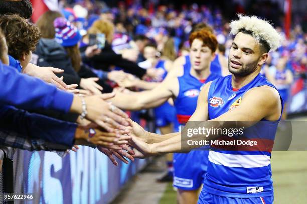 Jason Johannisen of the Bulldogs celebrates the win during the round eight AFL match between the Western Bulldogs and the Brisbane Lions at Etihad...