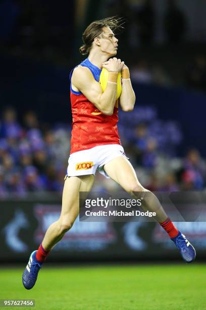 Eric Hipwood of the Lions marks the ball during the round eight AFL match between the Western Bulldogs and the Brisbane Lions at Etihad Stadium on...