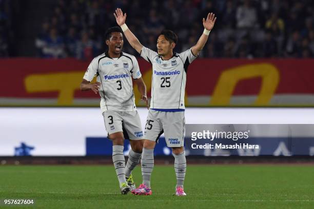 Jungo Fujimoto of Gamba Osaka celebrates the first goal during the J.League J1 match between Yokohama F.Marinos and Gamba Osaka at Nissan Stadium on...